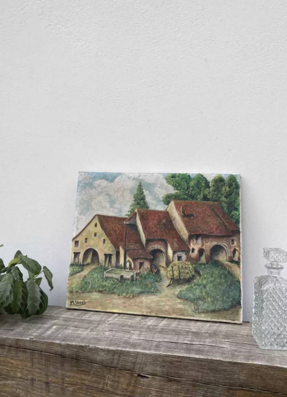 Naive painting of a farm in the Jura