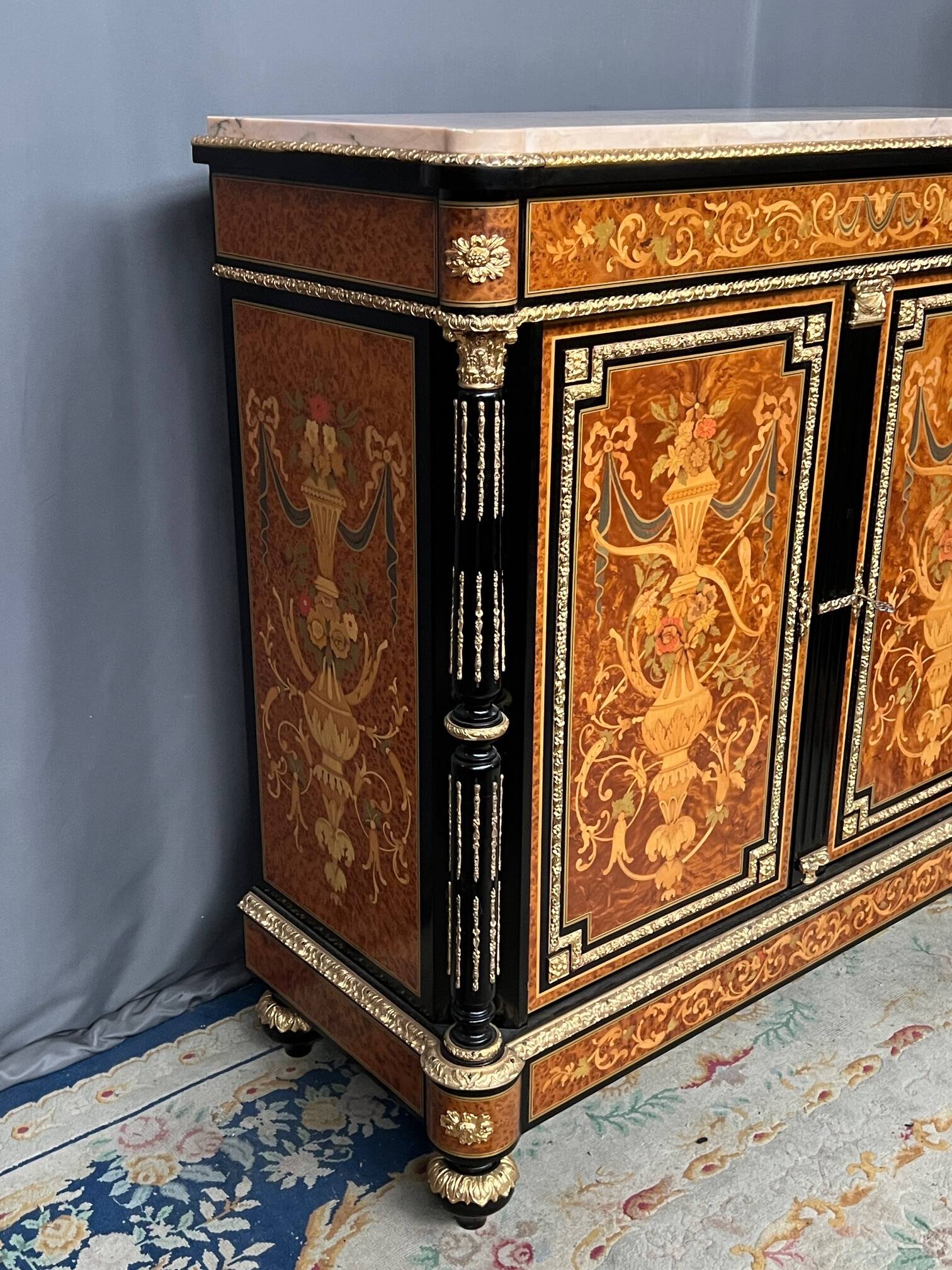 Two-door commode in Louis XVI style with marquetry and marble top.