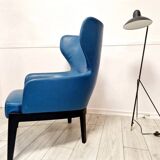 High back armchair by Rodolfo Dordoni