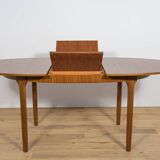 Mid-century extendable oval teak dining table from McIntosh, UK