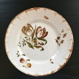 Old plate with floral decoration