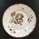 Antique plate with floral decoration