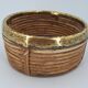 Cache-pot en rotin cerclé de laiton vers 1960 DLG Gabriella Crespi