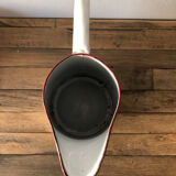 Old pitcher in enamelled sheet metal