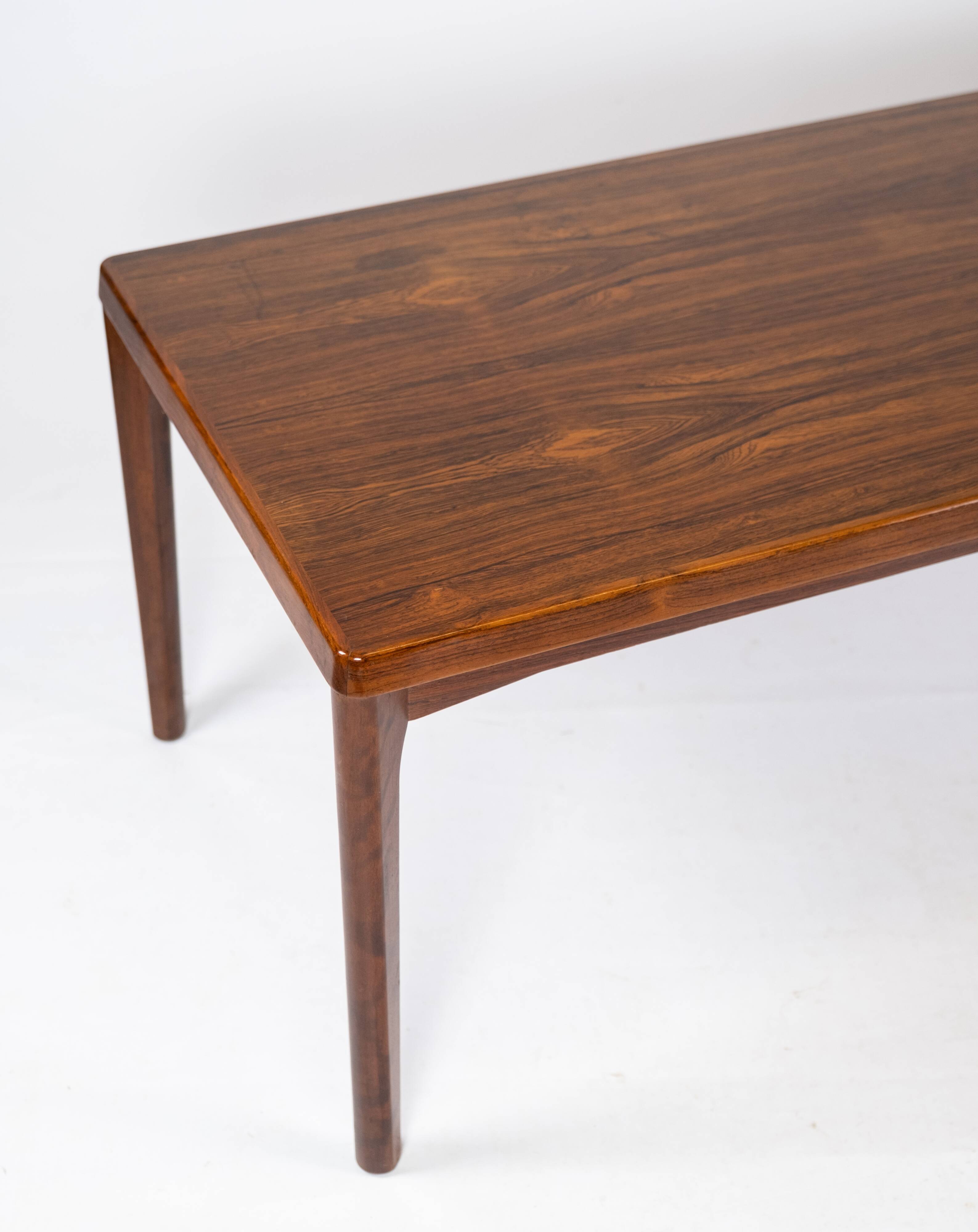 Coffee table in rosewood designed by Henning Kjærnulf, 1960s