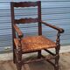 Pair of wooden and straw farmhouse armchairs