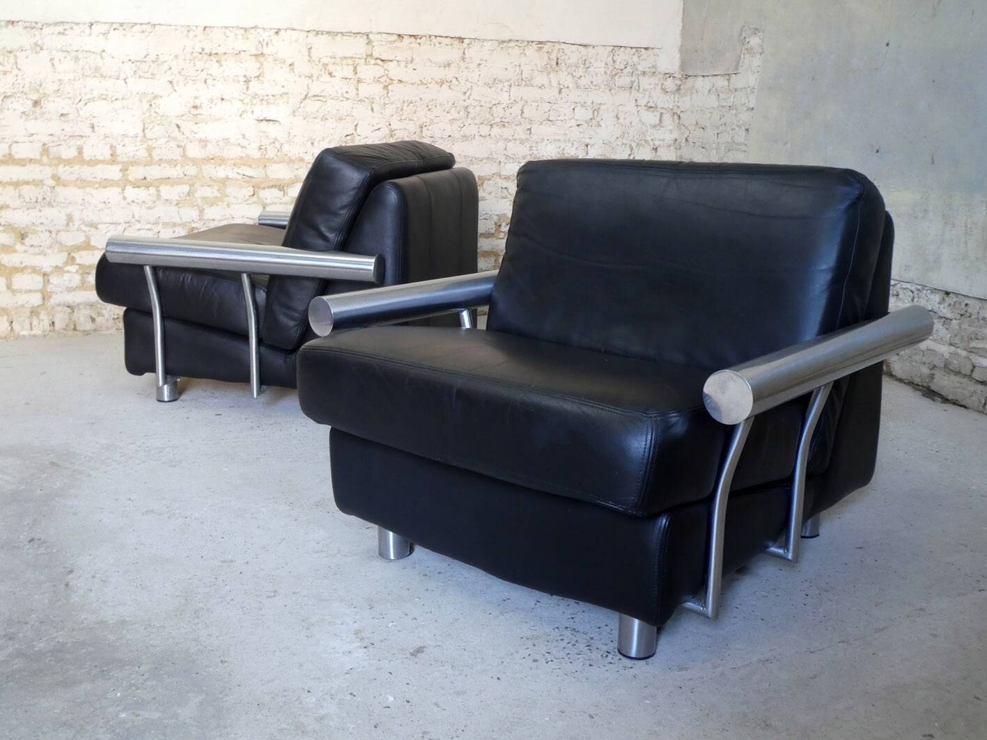 pair of armchairs, black leather & stainless steel, 1990