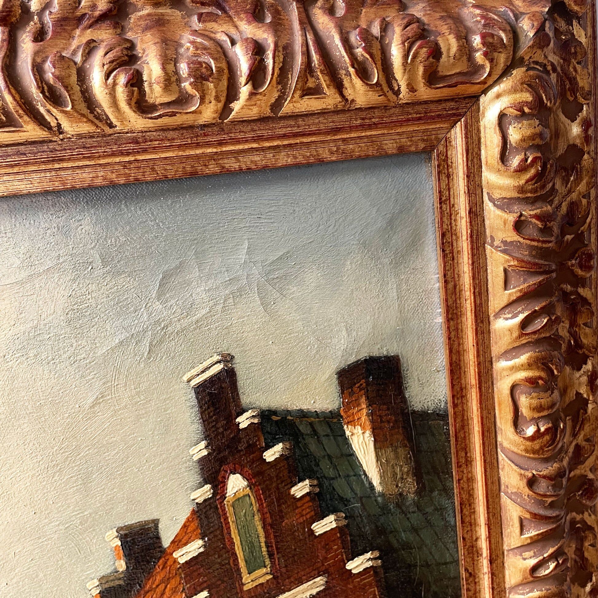 Dutch street scene oil painting in ornate frame signed Nijland