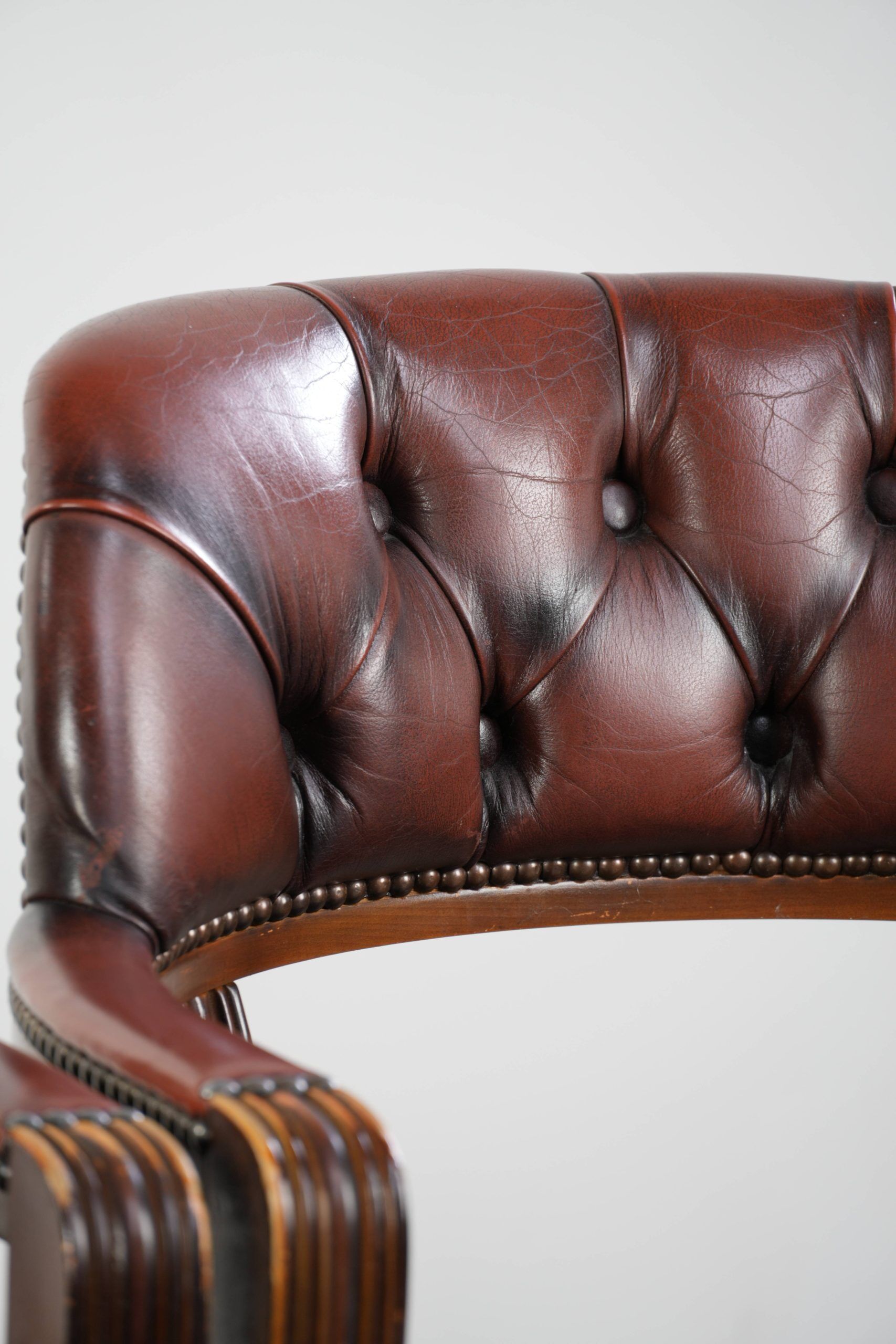 Set of two brown cowhide leather Chesterfield dining chairs