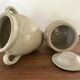 2 enamelled sandstone pots