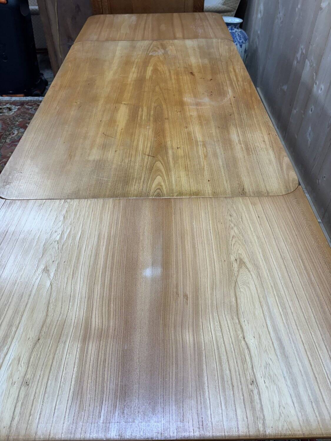 Table with extensions from the 1950s in elm.