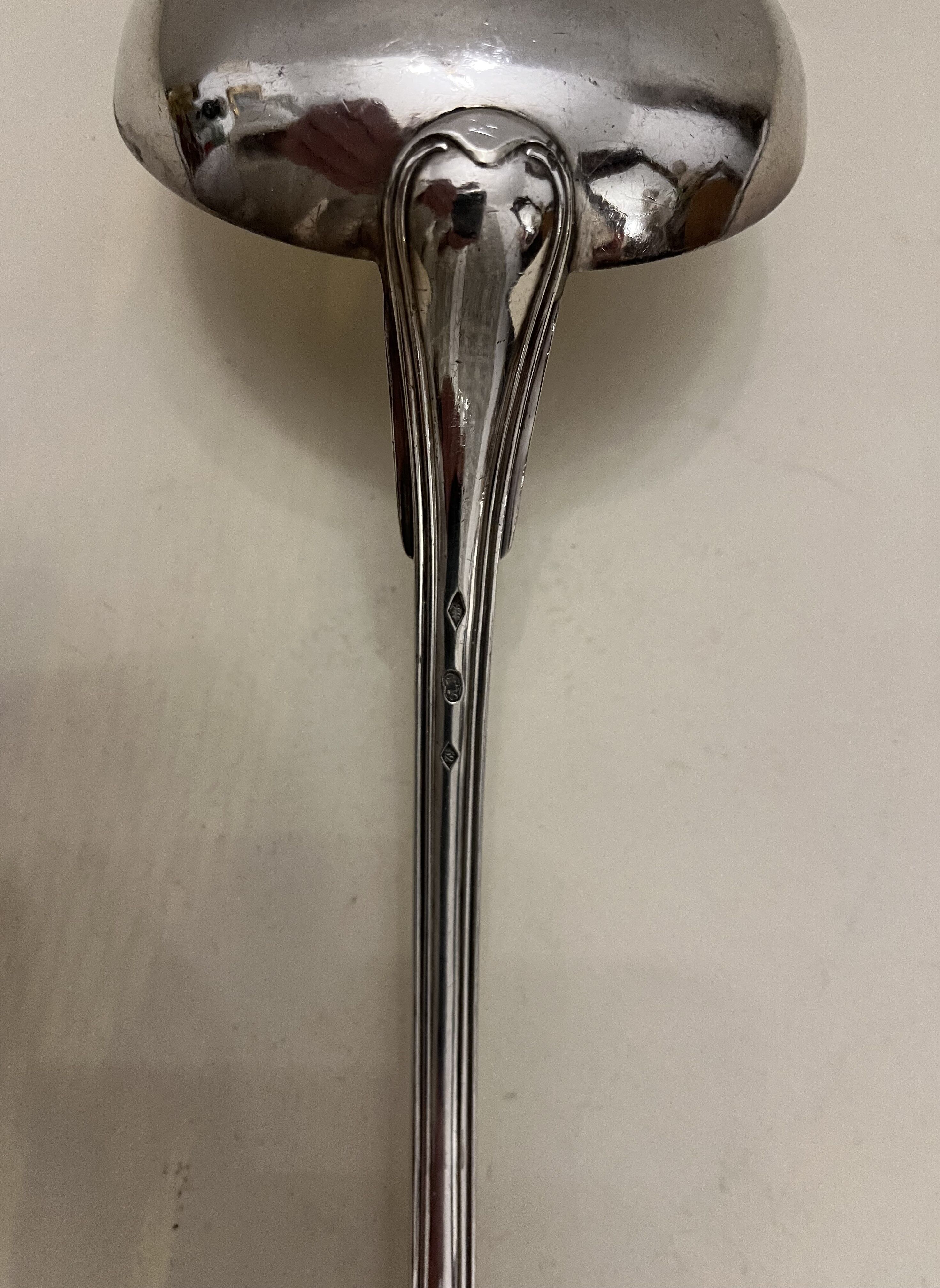 Silver metal ladle