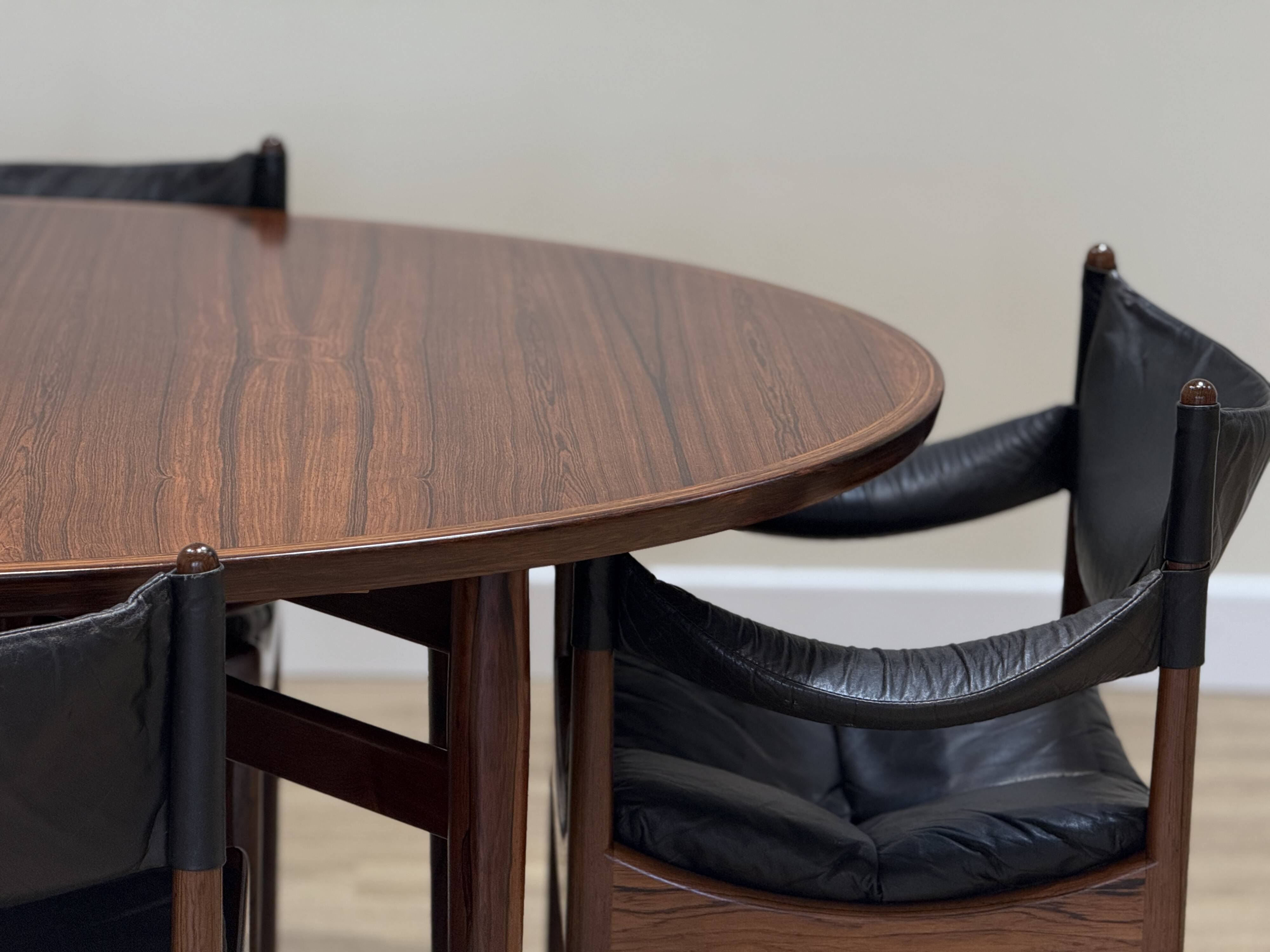 Extendable dining room table and chairs (by Kristian Solmer Vedel)