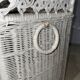 White rattan bedroom set: chest of drawers, mirror, bed, basket