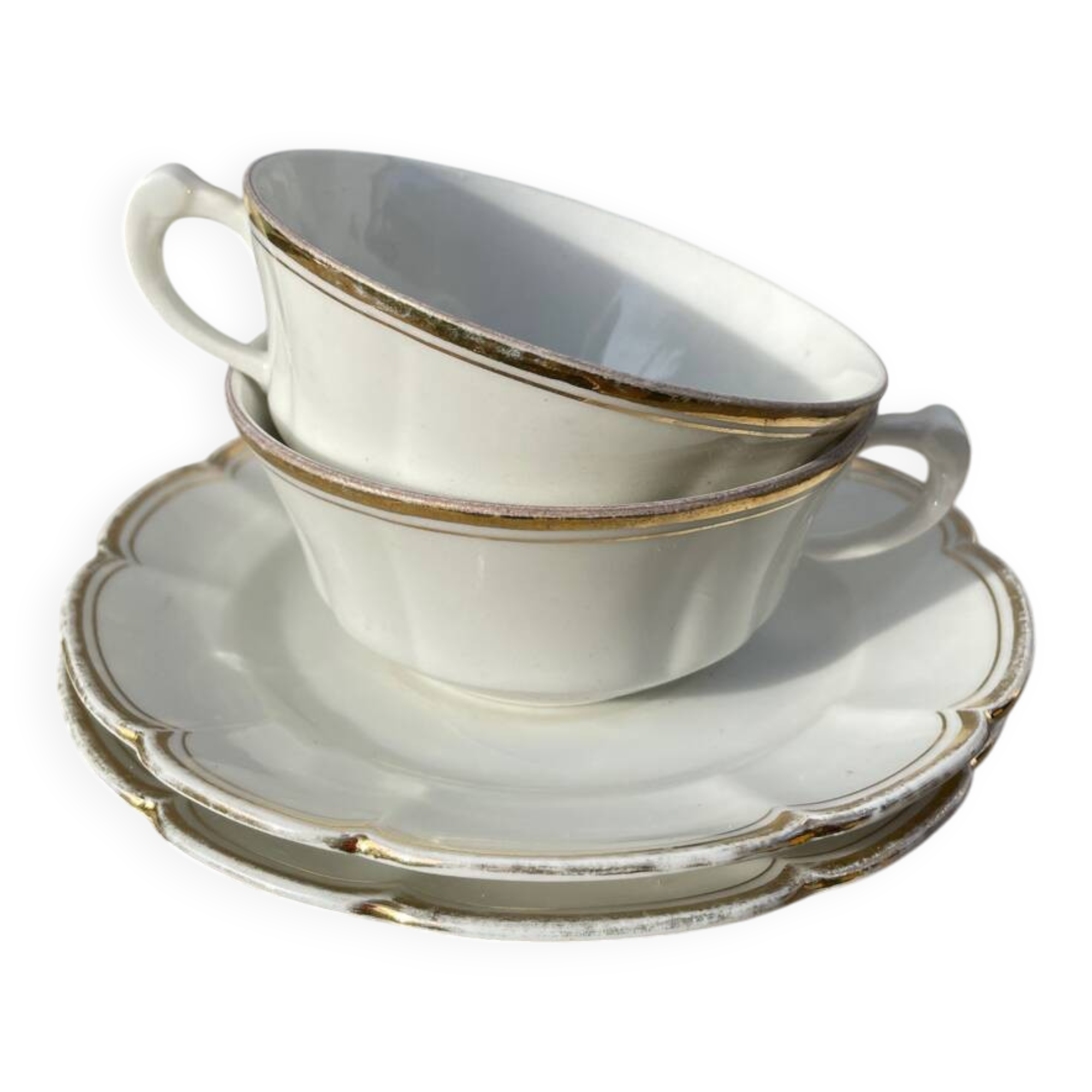 Pair of fine white and gold Limoges porcelain teacups