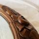 Large Art Deco oval mirror in carved wood - 87 x 53 cm
