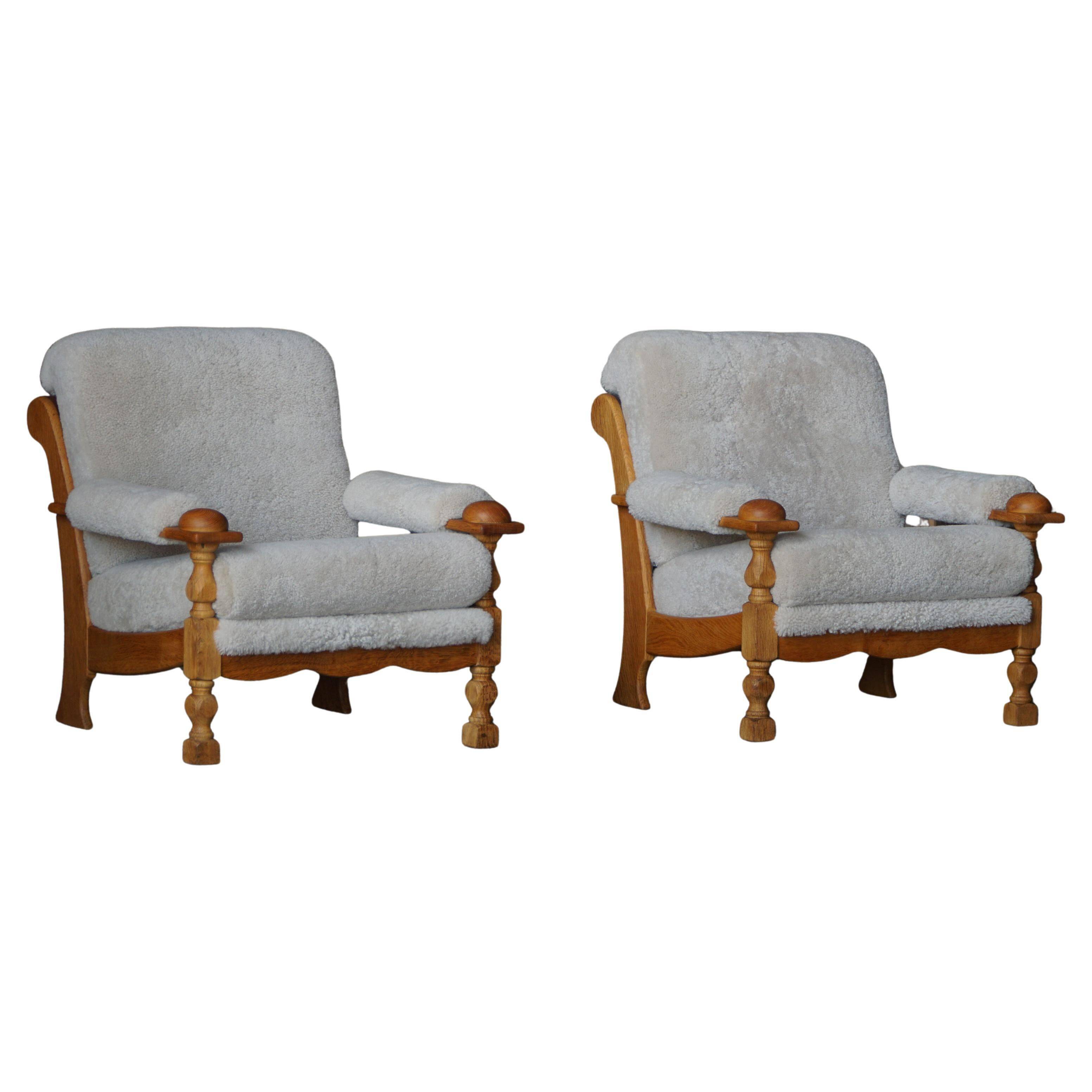 Henning Kjærnulf, lounge chairs in oak and lambswool, mid-century Danish, 1960s.