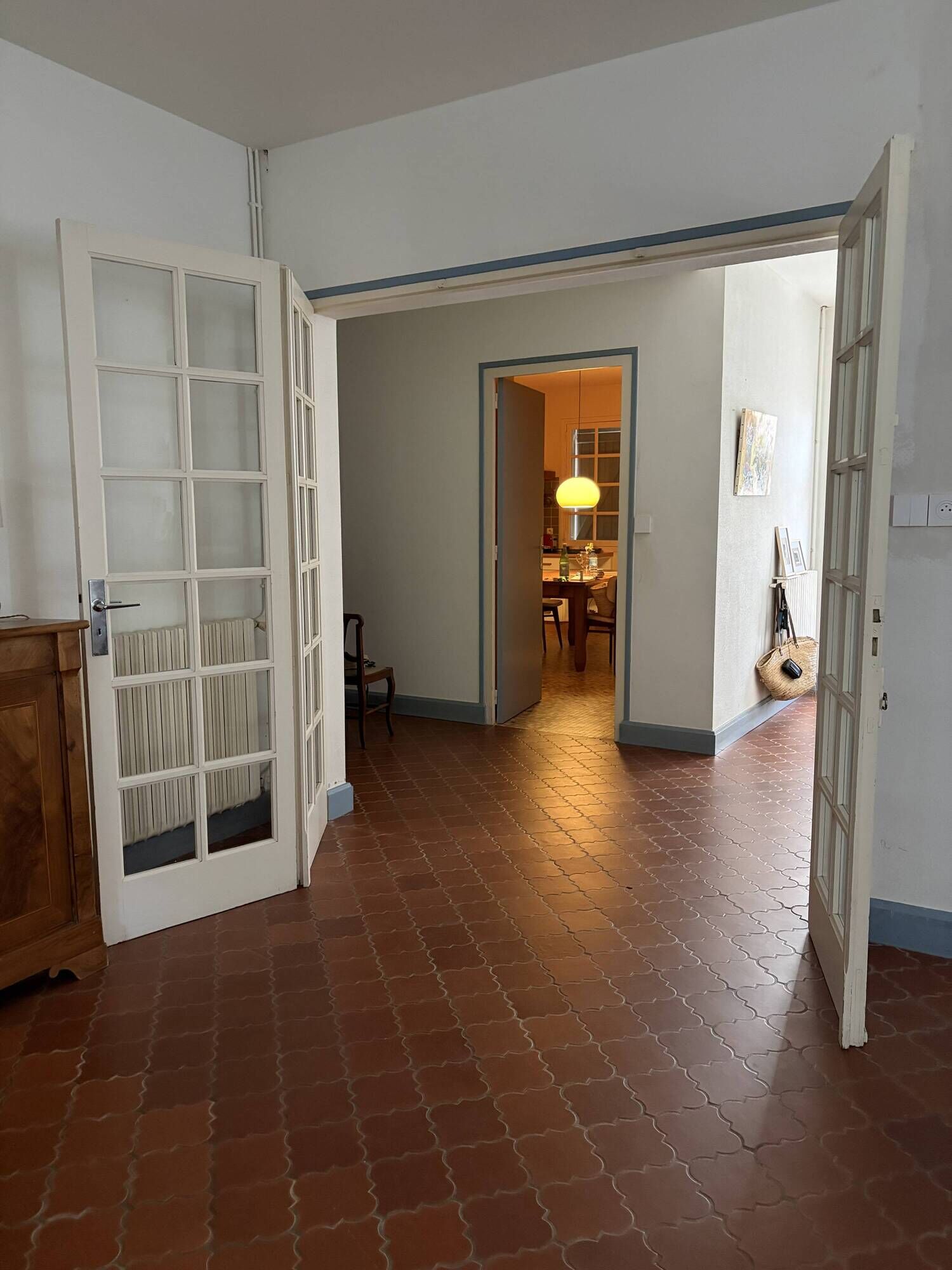 Triptych glass door with three panels featuring small panes. Vintage.