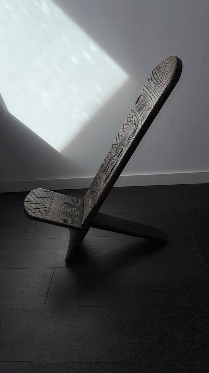 Traditional African carved wooden chair