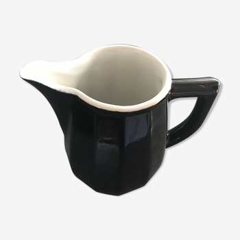 Milk pot in black and white earthenware