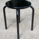 Black curved wooden stool
