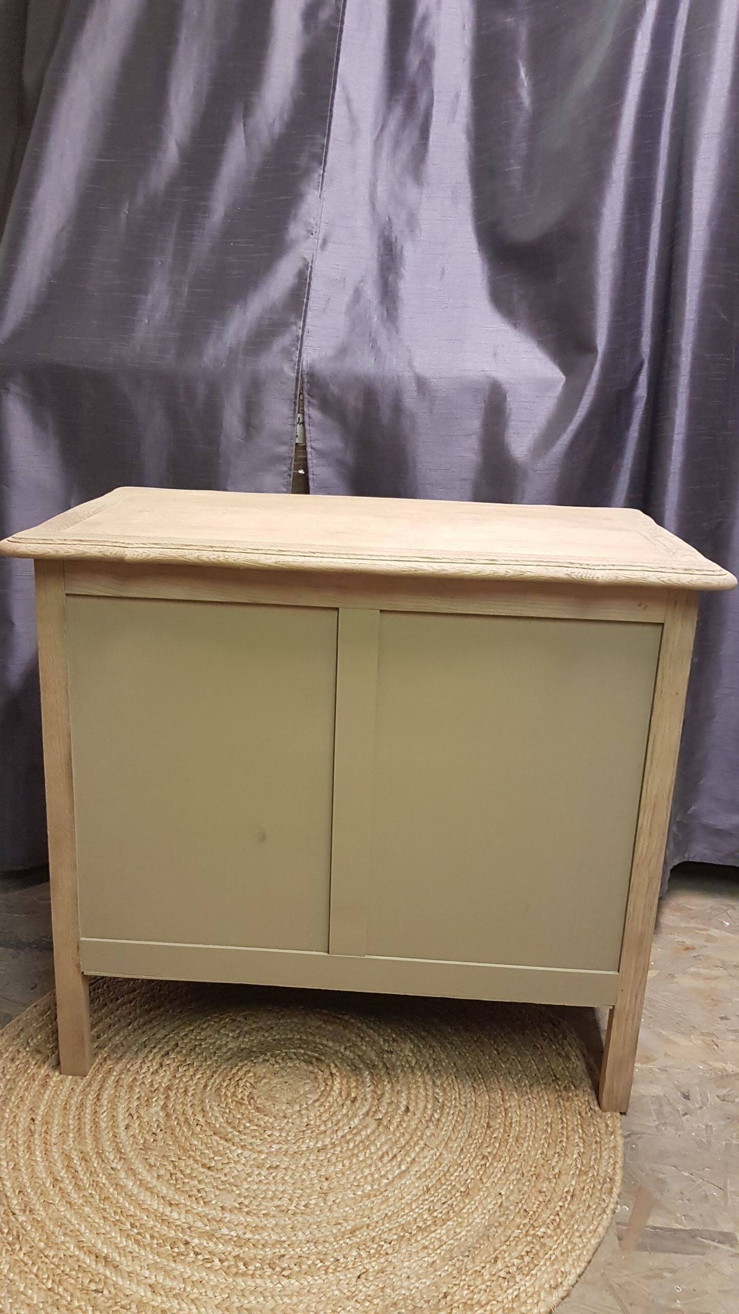 Old 2-door chest of drawers in air-coated oak, to be painted or varnished.