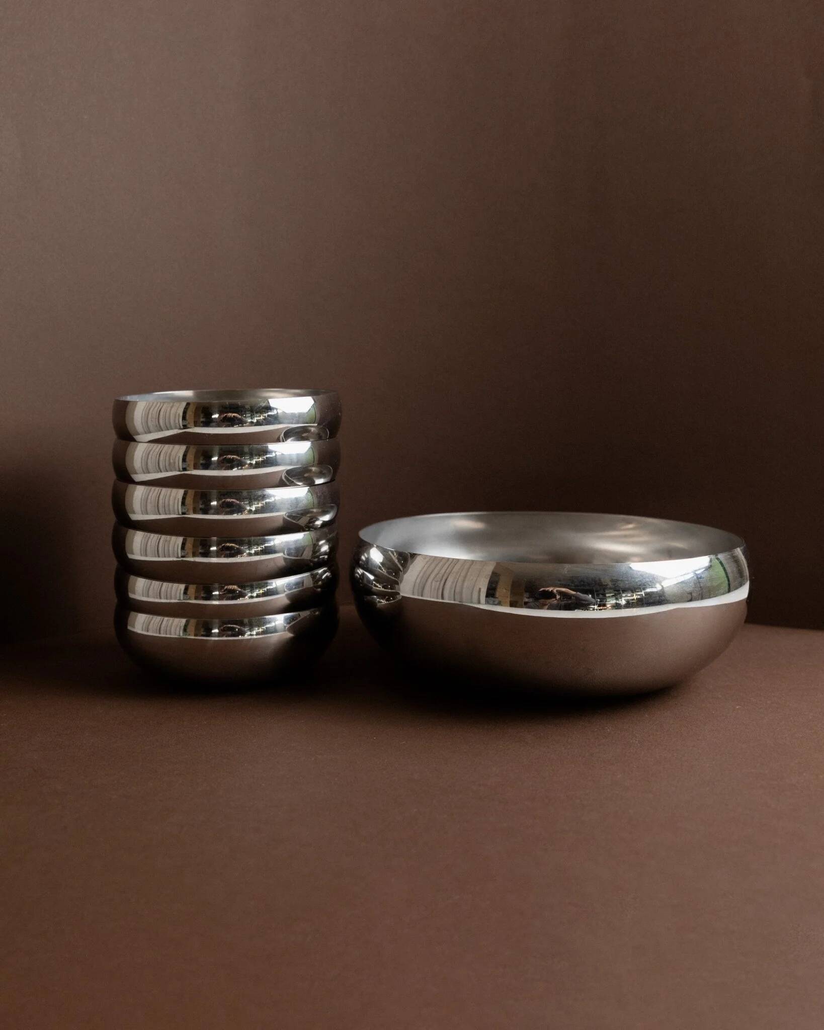 Set of 7 silver stainless steel bowls Space Age vintage Italian design stackable and elegant