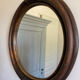 Round rattan mirror