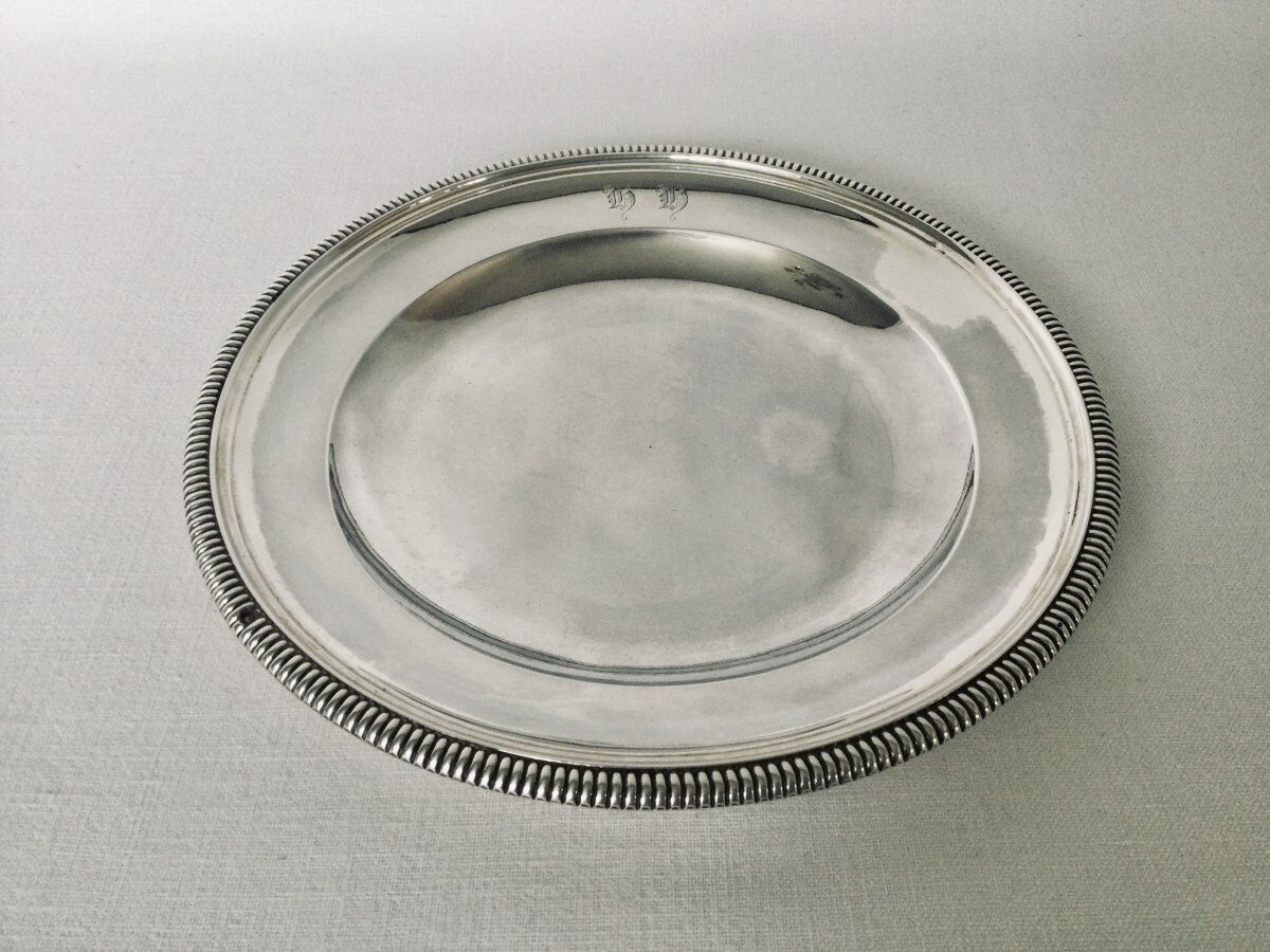 Solid silver dish with old man