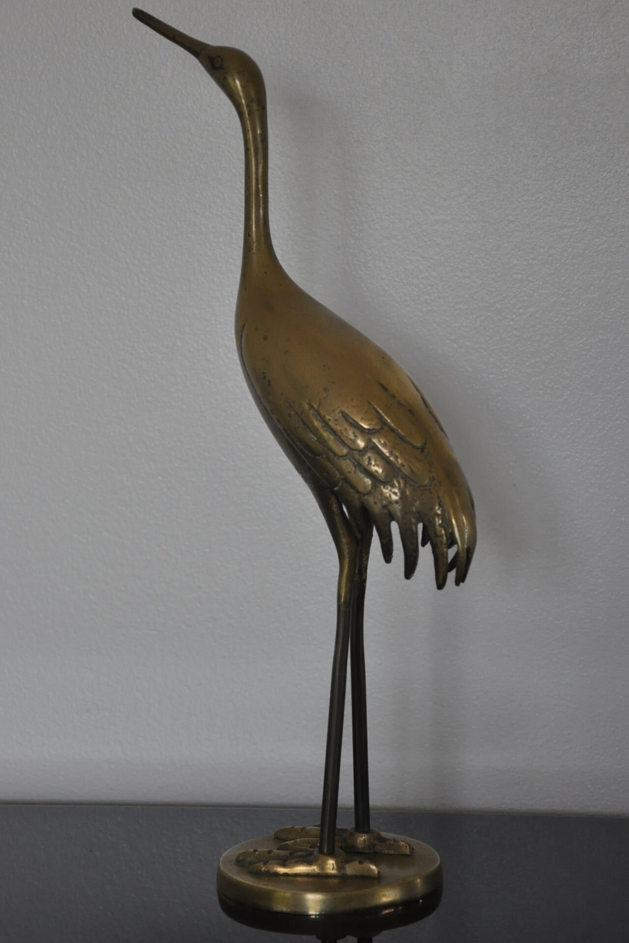Vintage bronze statue wader