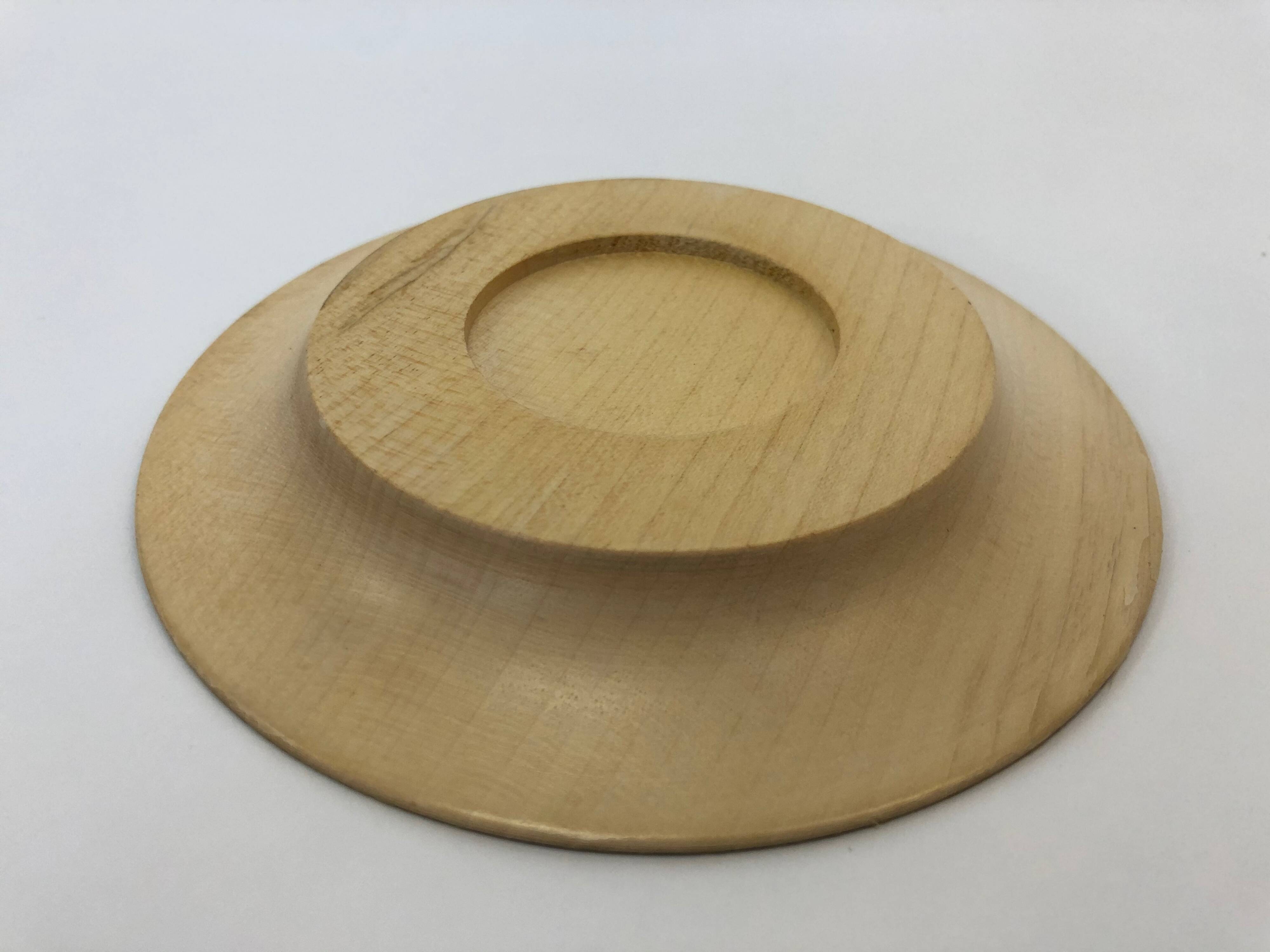 Vintage wooden cups and saucers in teak