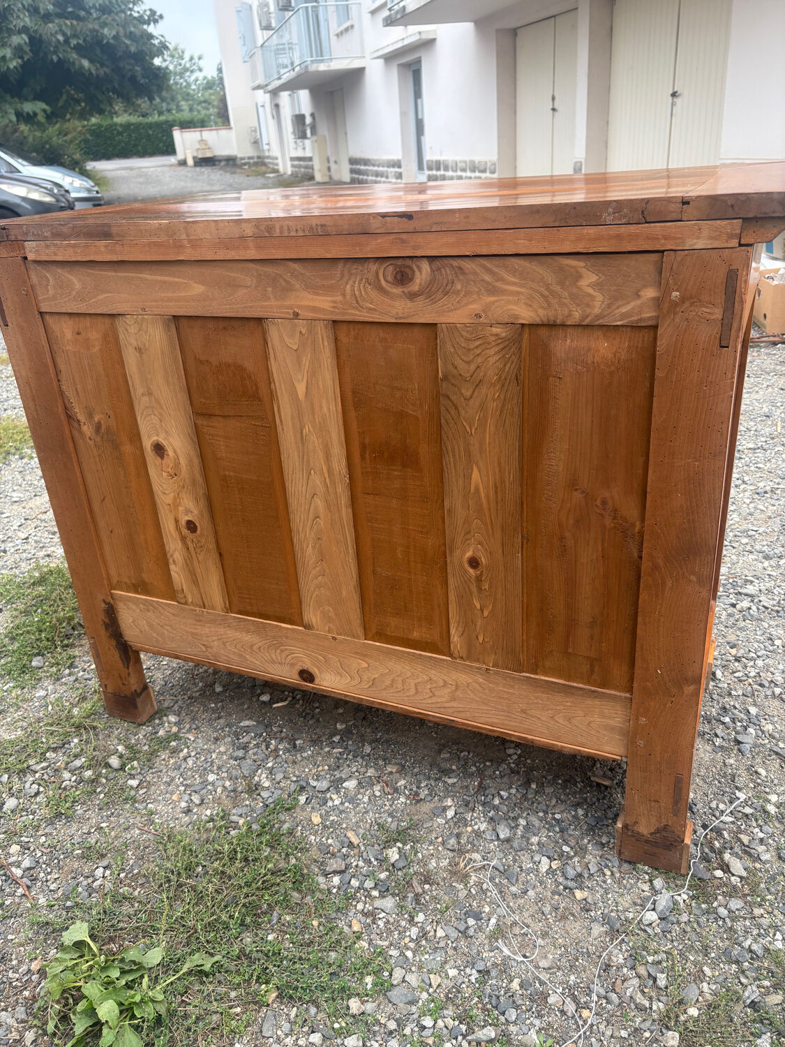 Restoration period walnut chest of drawers with a scroll handle