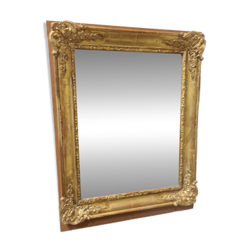 Antique gilded mirror, 19th century Empire style.