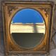 Miroir en bois doré  67 x 77 cm