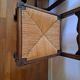 6 wooden and straw chairs