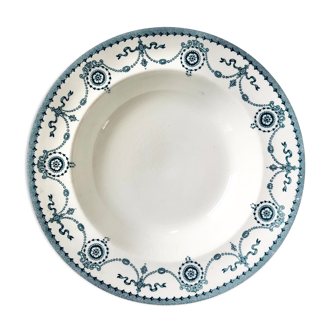 Hollow plate in semi-white porcelain with a decoration