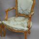 Pair of Louis XV style armchairs in moulded and carved beech.