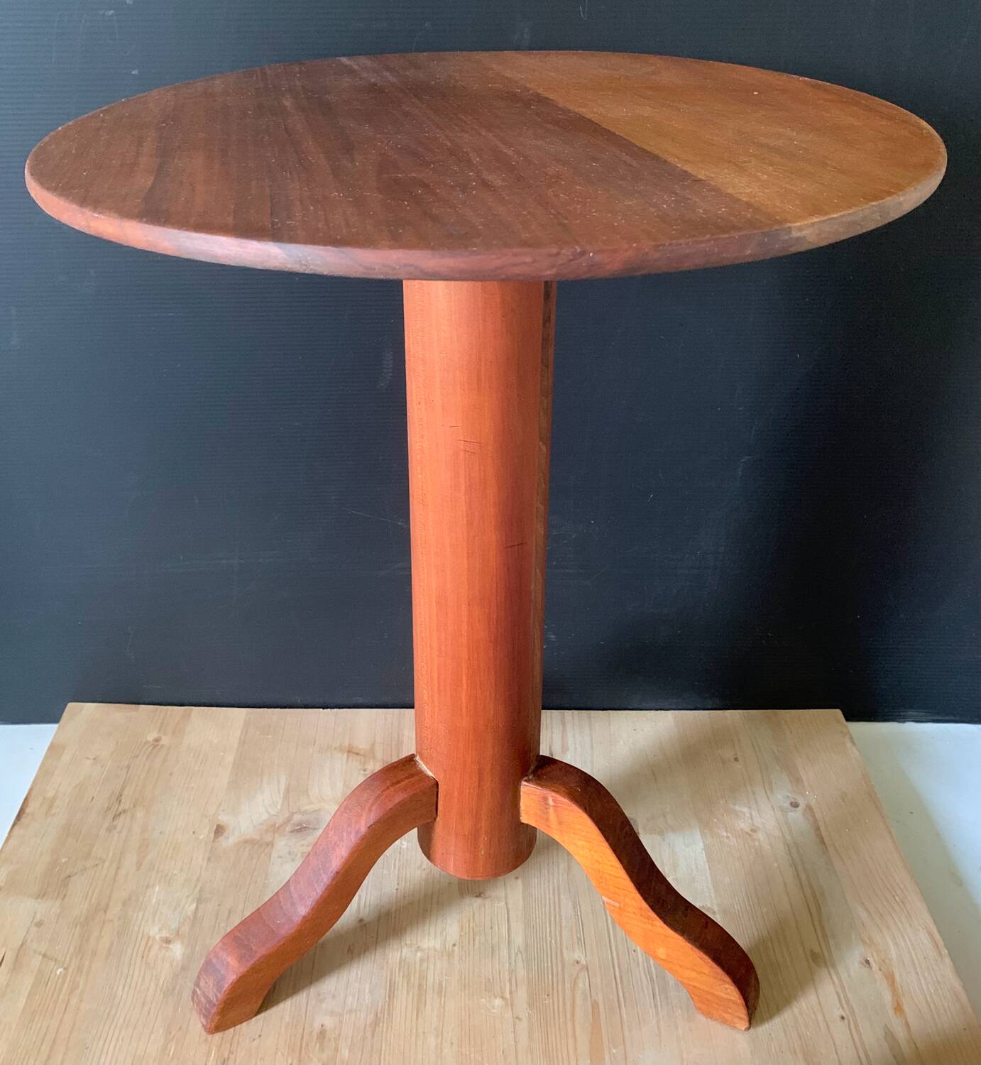 Wooden pedestal table