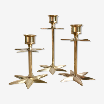 Trio of brass candlesticks