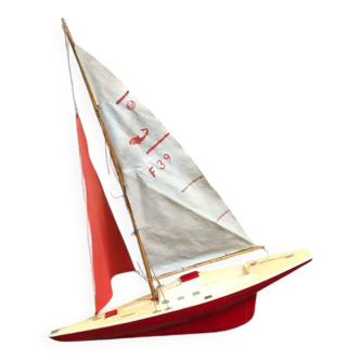 Old plastic pond sailboat, old plastic boat