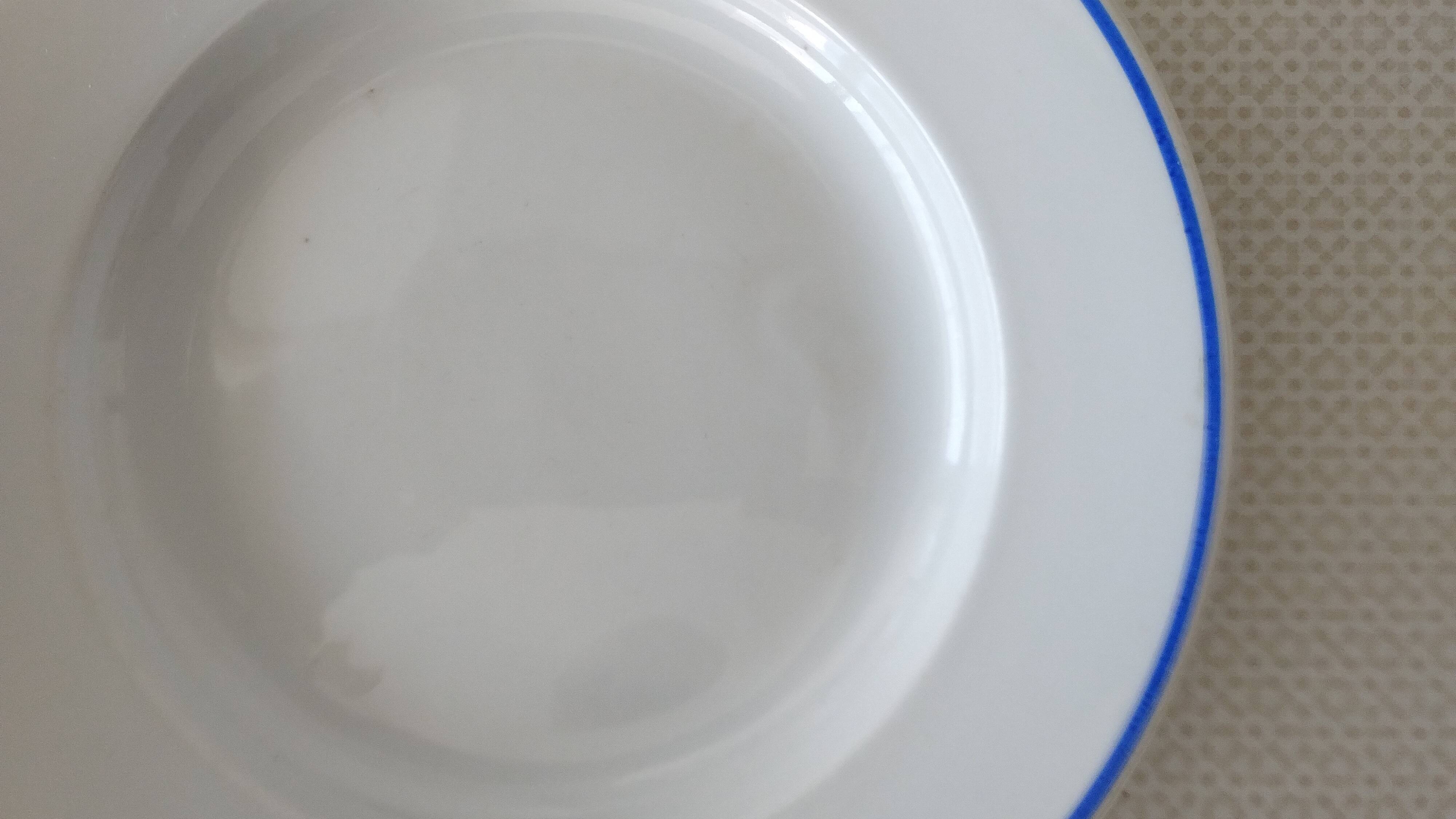 3 Pillivuyt white porcelain dinner plates with blue edging.