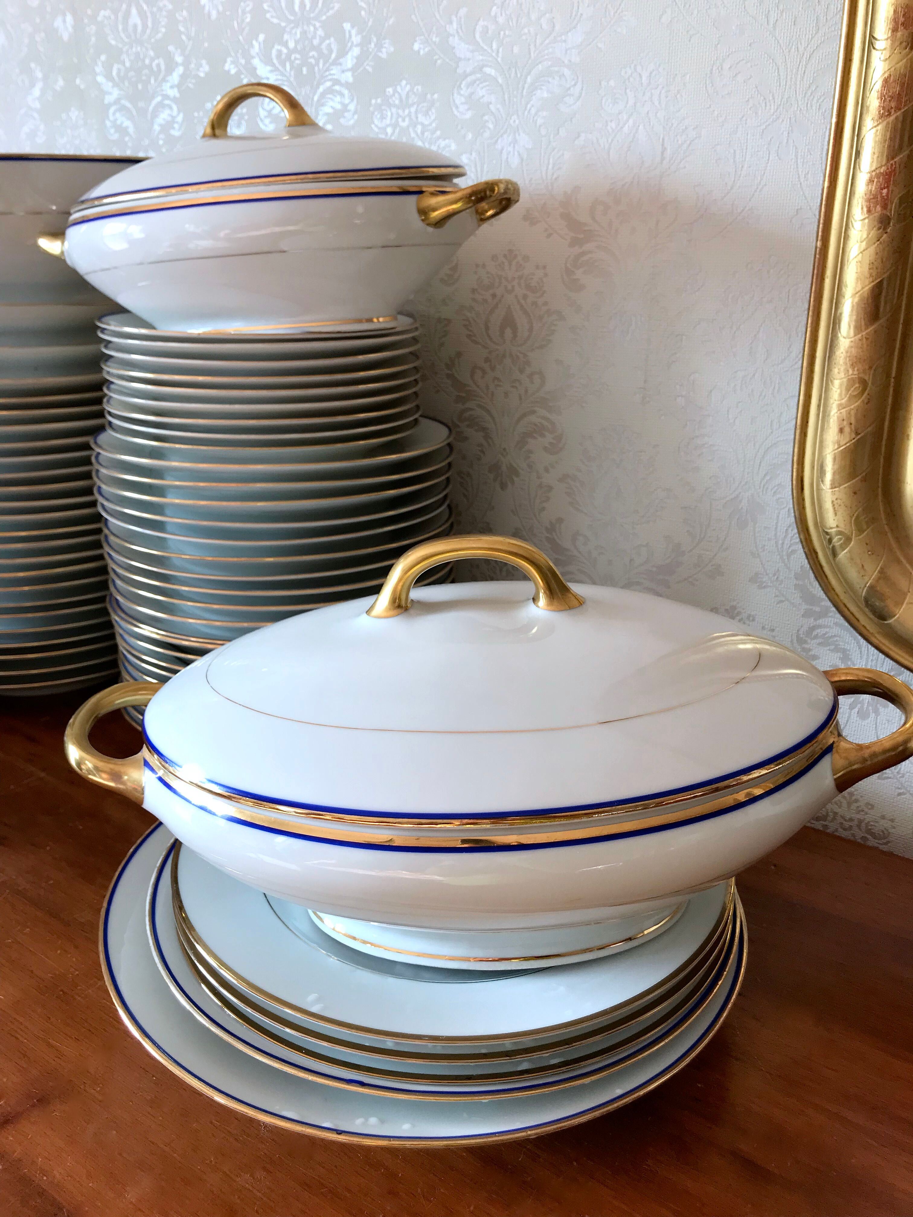 table service art deco limoges porcelain white border blue and gold 61 pieces signed