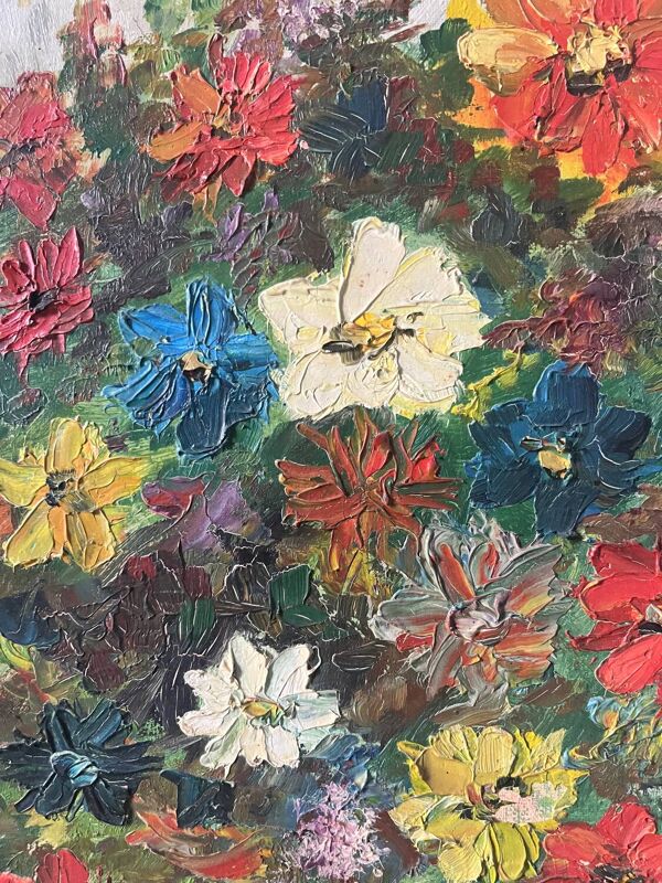 Bouquet de fleurs dans un vase bleu, signé