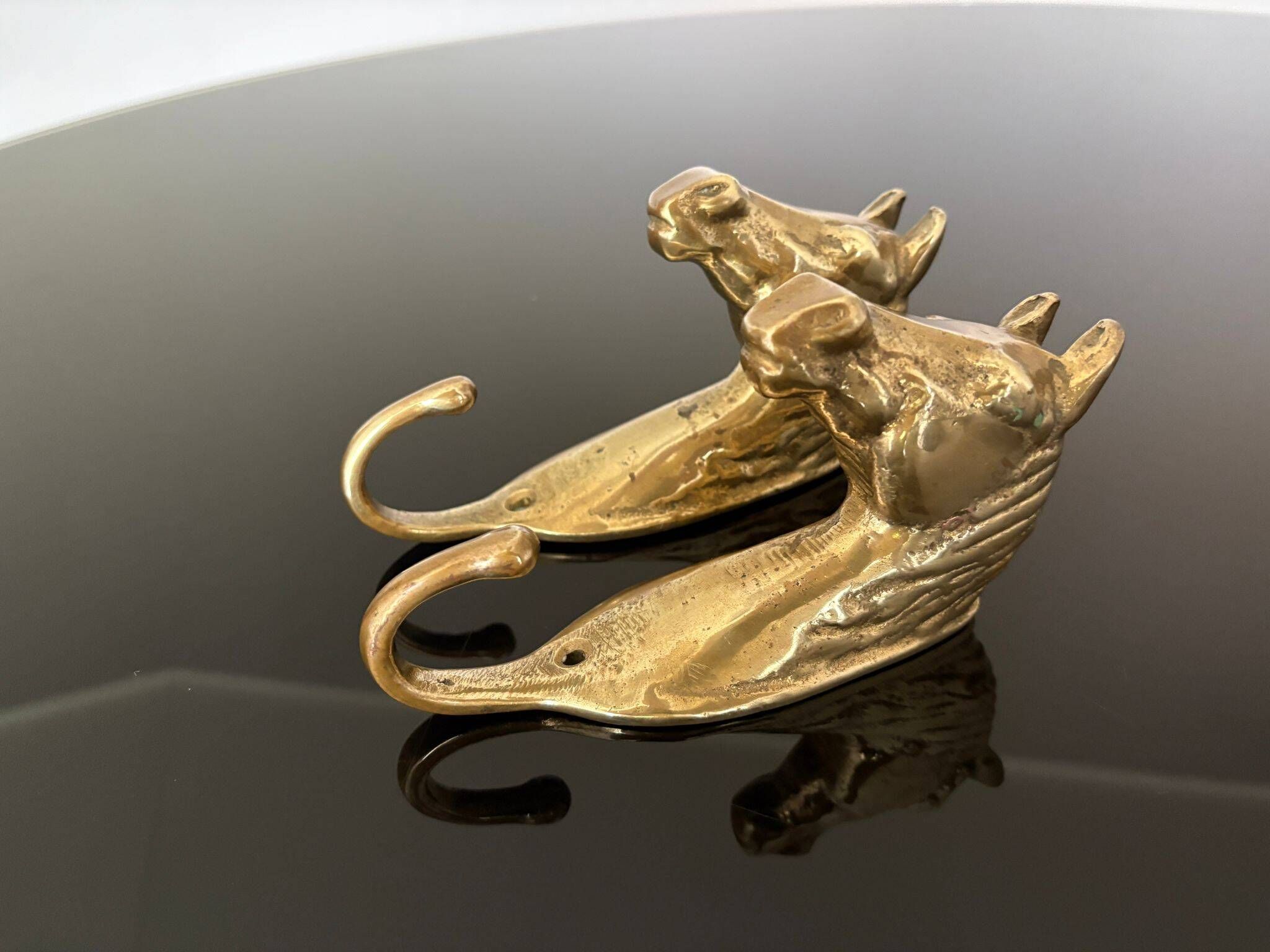 Pair of bronze coat hooks - Italy, 1950s