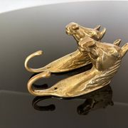 Pair of bronze coat hooks - Italy, 1950s