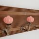 Wall-mounted coat rack with 5 hooks, powder pink ceramic and stained wood, 50 cm.
