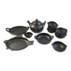 Black terracotta dinnerware set from La Chamba in Colombia. Set of 13 pieces.