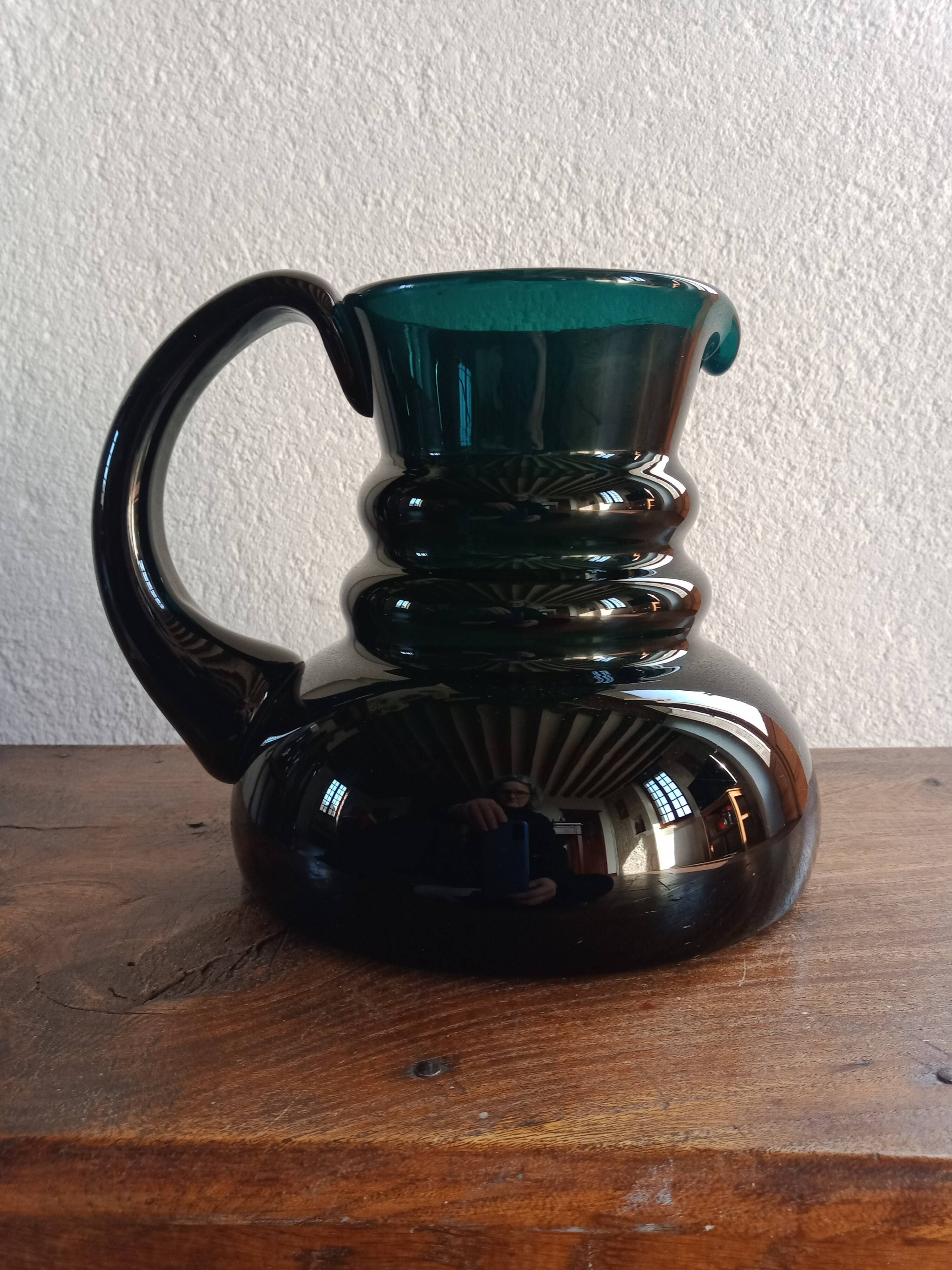 Deep green jug or pitcher with modern design - thick glass