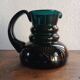 Deep green jug or pitcher with modern design - thick glass