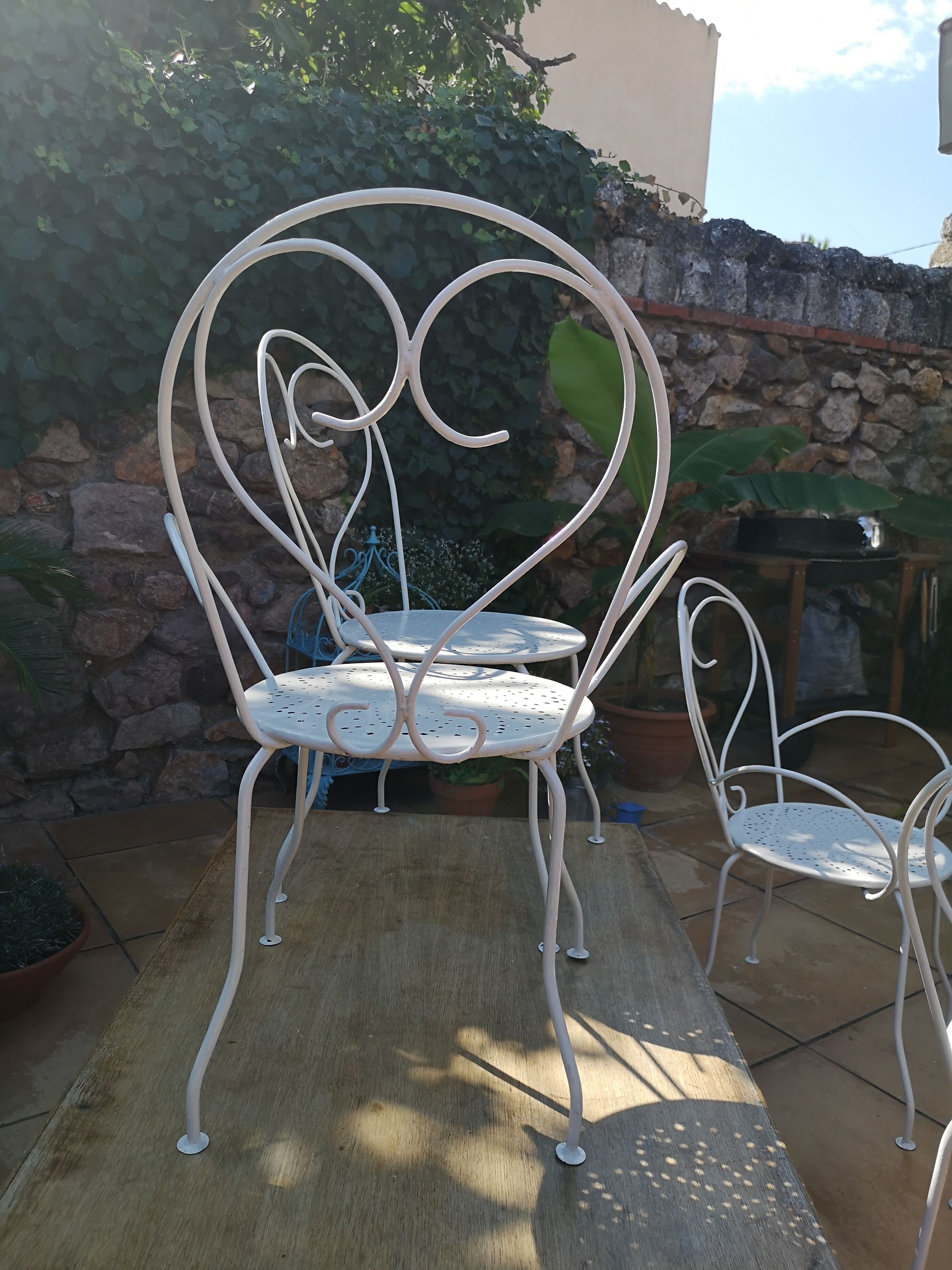 Lot of wrought iron chairs and armchairs